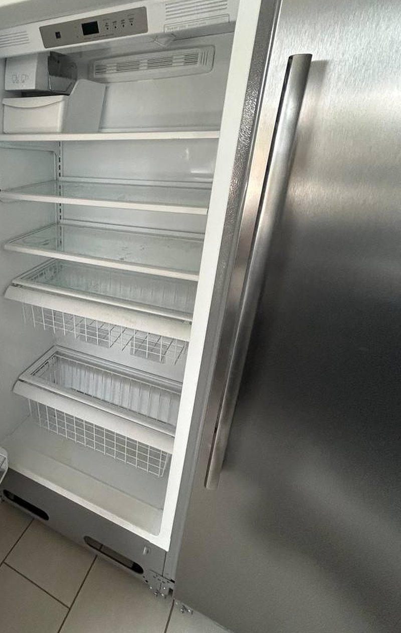 Built-in all-refrigerator column with the door open during a cooling diagnostic